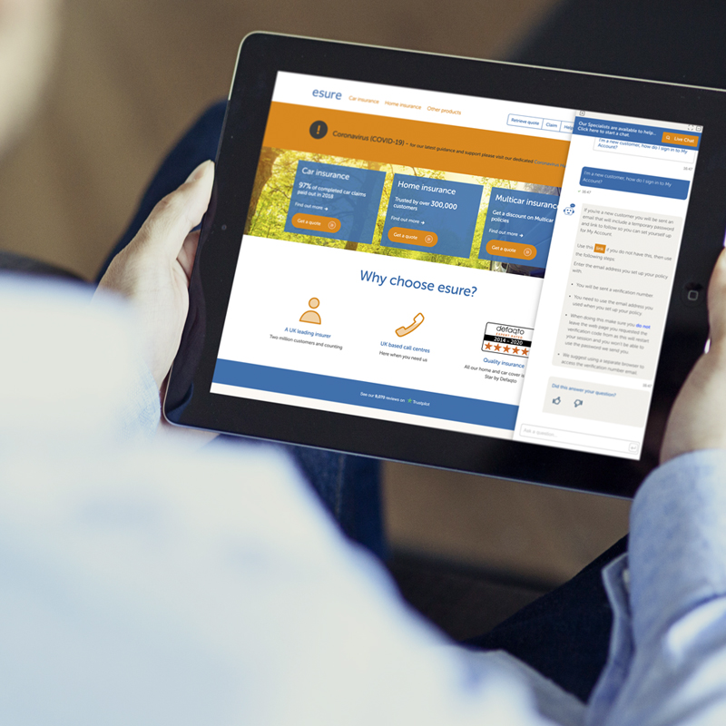 Image of man using a chatbot on an ipad